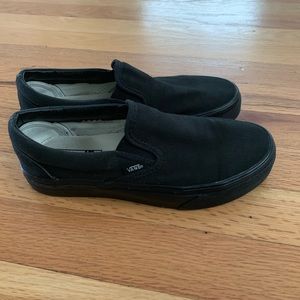 Black slip-on Vans women’s size 6.5, men’s 5